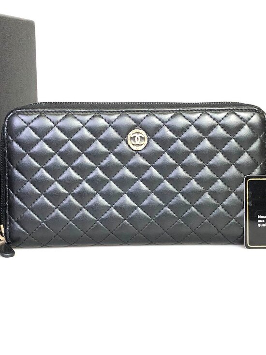 CHANEL Handbags - CHANEL Quilted Zip-Around Leather Wallet in Black with Silver CC
